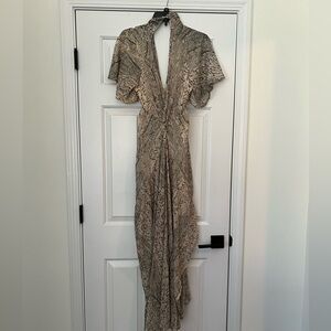 High Low Deep V-Neck high low flowey Dress with gold accents and cut out waist